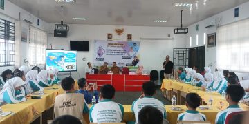 Dari Sekolah Sempit Tanjung Uncang, Alfida Hasan Menumbuhkan Literasi