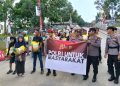 Polresta Barelang Bagikan 100 Karung Beras SPHP Gratis kepada Warga Nongsa pada Hari Bhayangkara ke-80